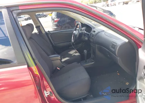 2001 Toyota Corolla S из США, поврежденный, VIN 2T1BR12E11C494695